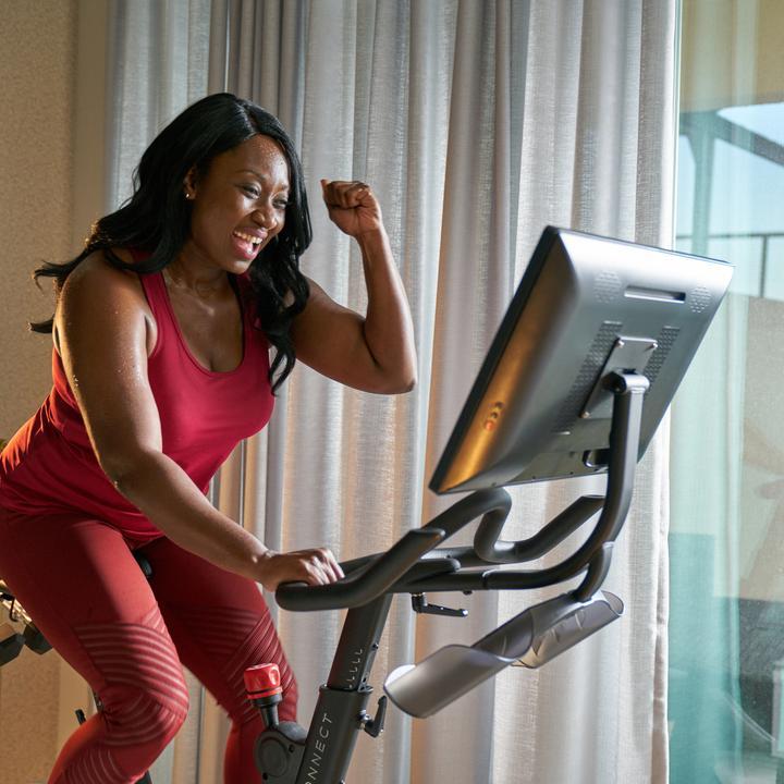 Couple working out on Row-S in their bedroom.